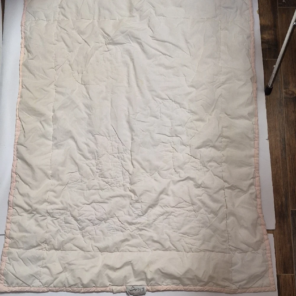 Pastel Embroidered Baby Quilt with Floral Accents